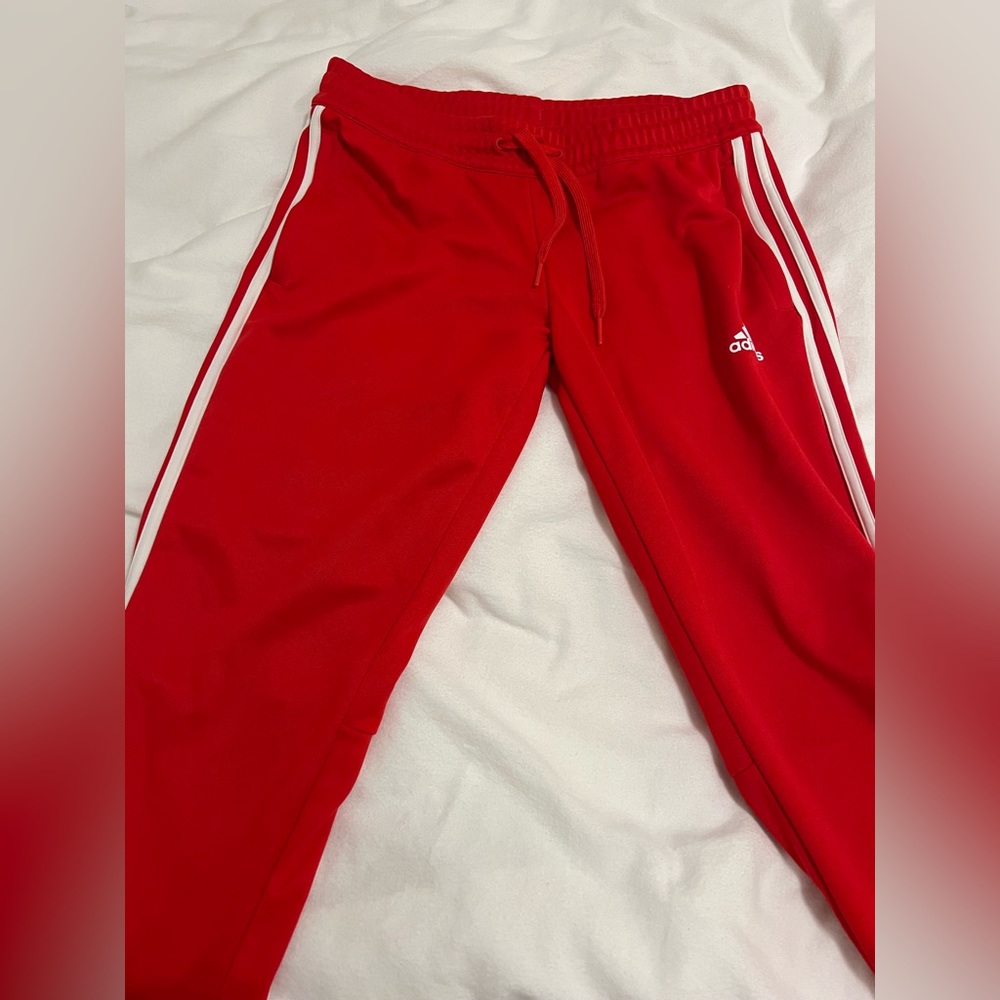Red adidas pants